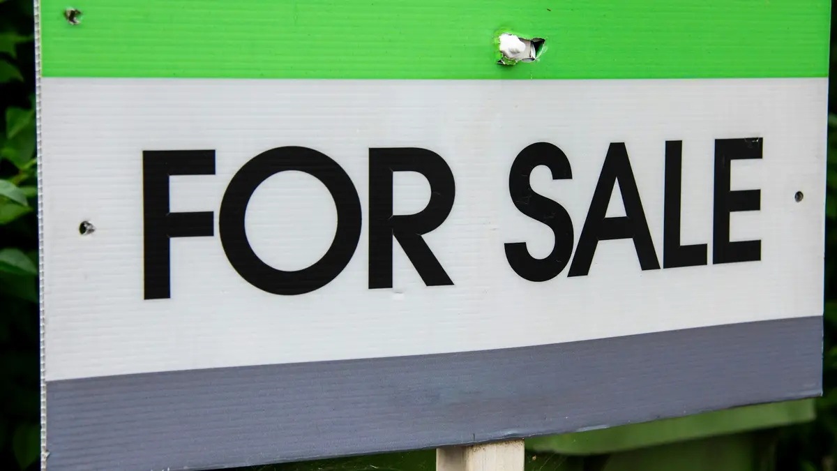 A For Sale sign outside a property