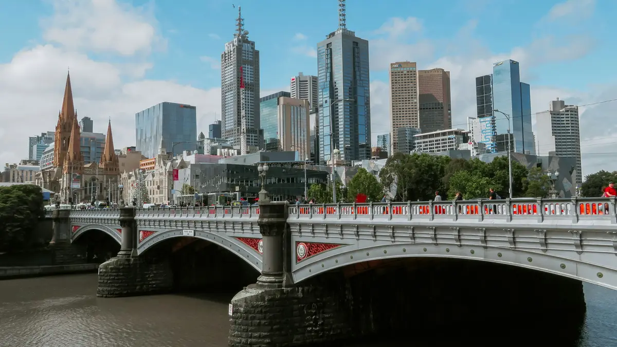 Melbourne's city skyline behind Princes Bridge over the Yarra River
