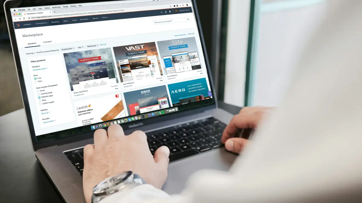 Someone browsing a website on a laptop